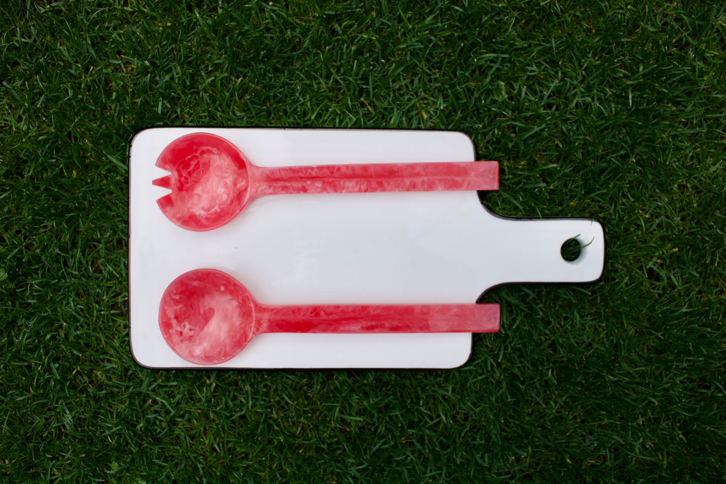 Roze gemarmerde saladescheppen