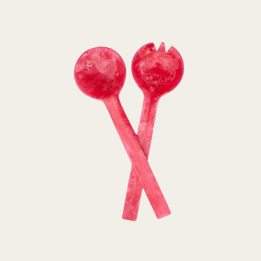 Roze gemarmerde saladescheppen
